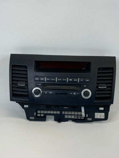08 09 MITSUBISHI LANCER DASH PANEL RADIO AM/CD PLAYER W A/C VENTS 8002A377XA OEM