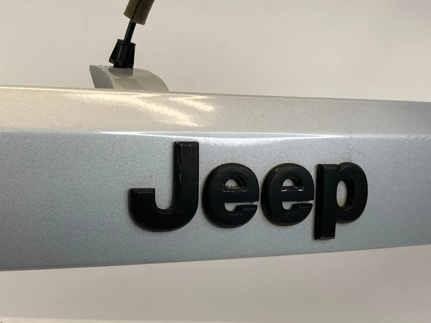 2009-2017 JEEP PATRIOT TRUNK TAILGATE LID LICENSE PLATE BEZEL TRIM MOLDING OEM