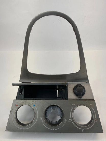 03-08 TOYOTA MATRIX SHIFTER CLIMATE CONTROL TRIM BEZEL W STORAGE & POWER OUTLET