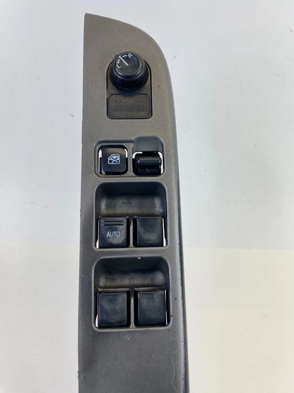 2000-2004 NISSAN XTERRA FRONT LEFT MASTER WINDOW CONTROL SWITCH W/ BEZEL OEM