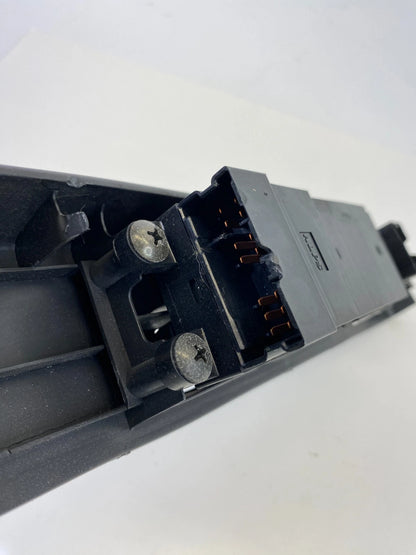 2000-2004 NISSAN XTERRA FRONT LEFT MASTER WINDOW CONTROL SWITCH W/ BEZEL OEM