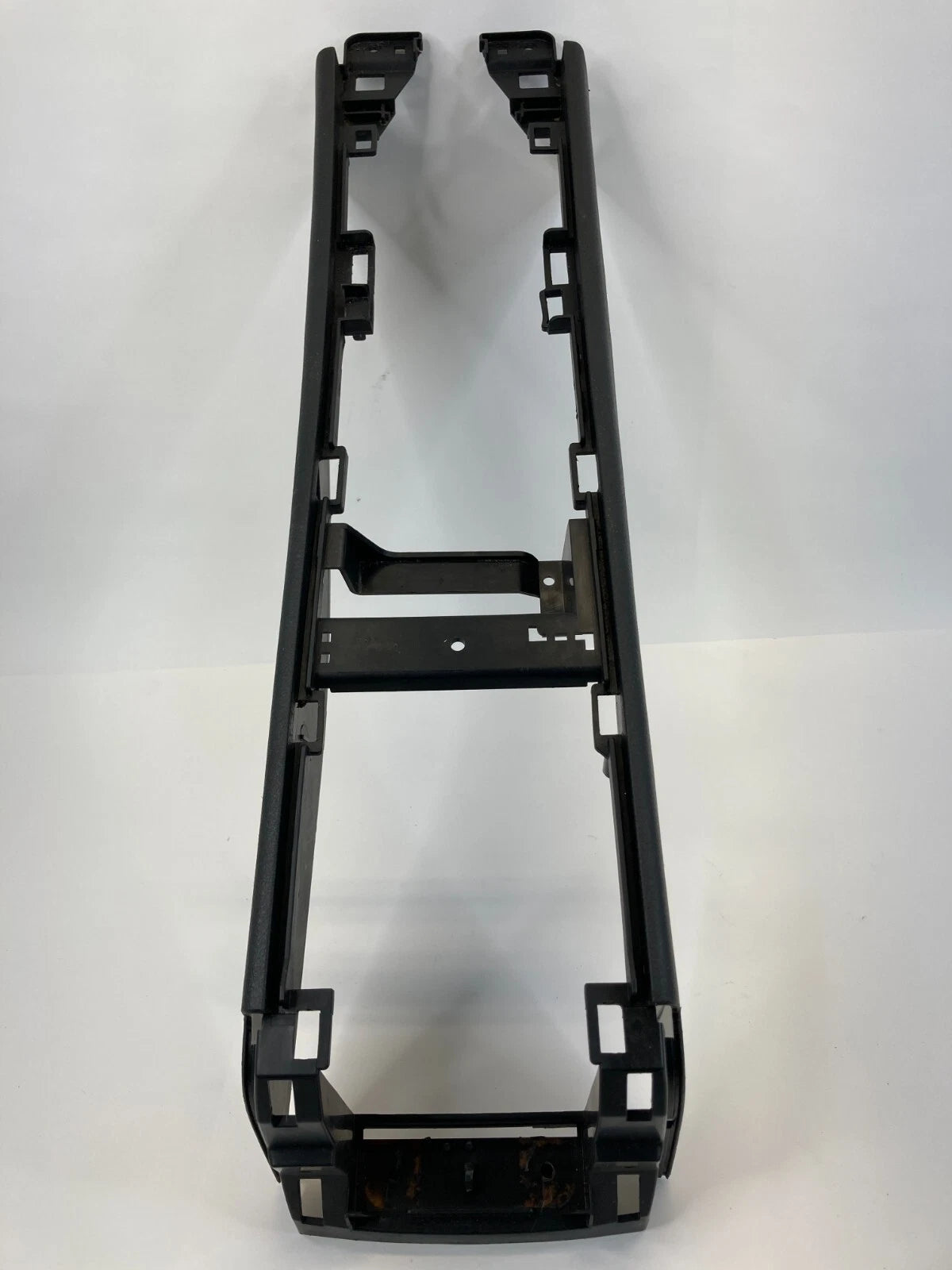 07-12 NISSAN VERSA FRONT FLOOR CENTER CONSOLE BASE BODY FRAME TRIM 96911-EL00A