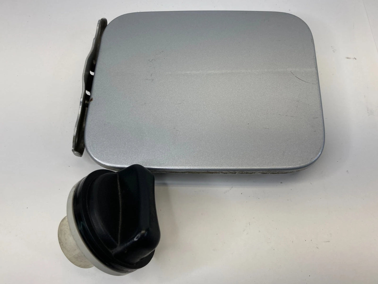 2004-2010 INFINITI QX56 FUEL FILLER GAS DOOR LID COVER W/ TANK CAP OEM