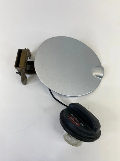 2008-2011 FORD FOCUS SEDAN FUEL FILLER GAS DOOR LID COVER W/ CAP OEM