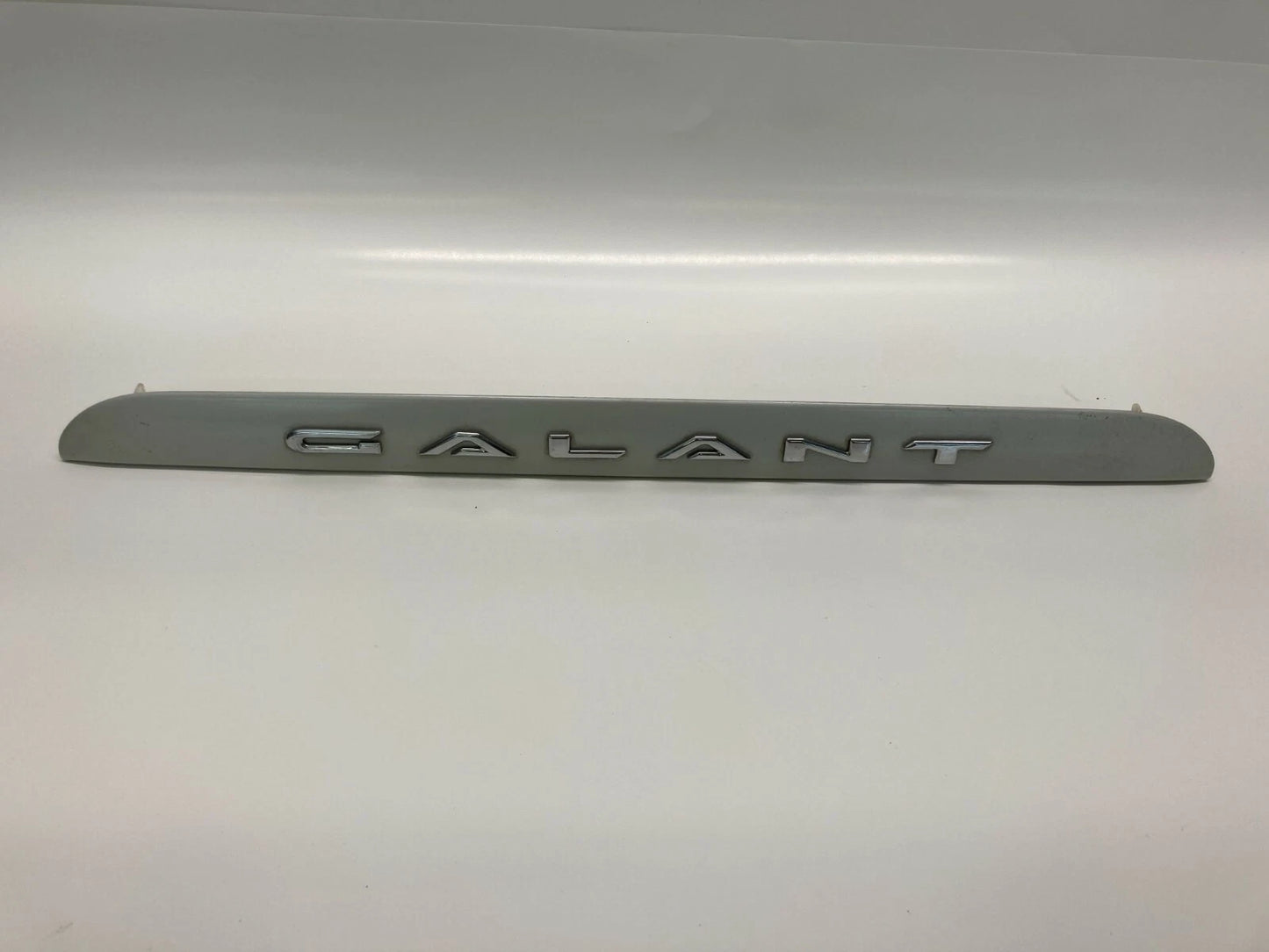 1999-2003 MITSUBISHI GALANT TRUNK HANDLE TRIM MOLDING PLATE BEZEL OEM FACTORY