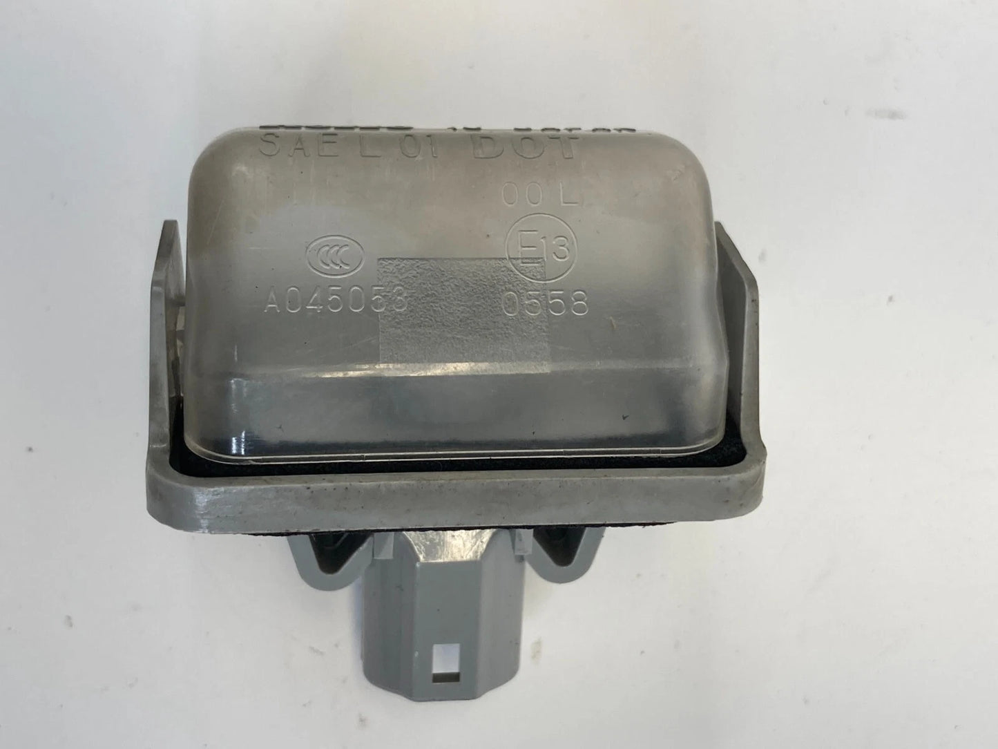 2007-2012 MAZDA CX-7 CX7 REAR TAILGATE LICENSE PLATE LIGHT LAMP 130-61971 OEM
