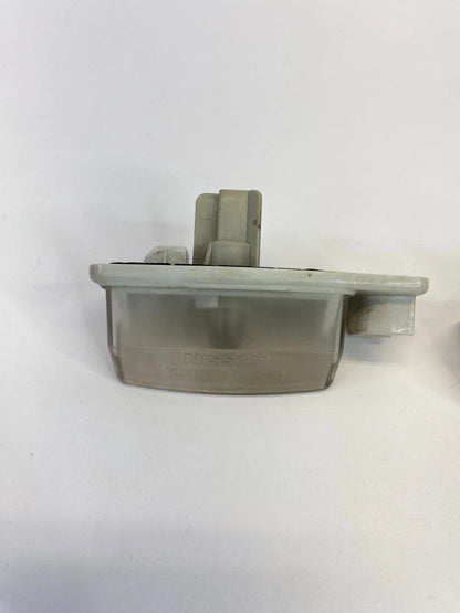 2007-2012 NISSAN ALTIMA LICENSE PLATE LIGHT LAMP TAG HOUSING LENS PAIR OEM