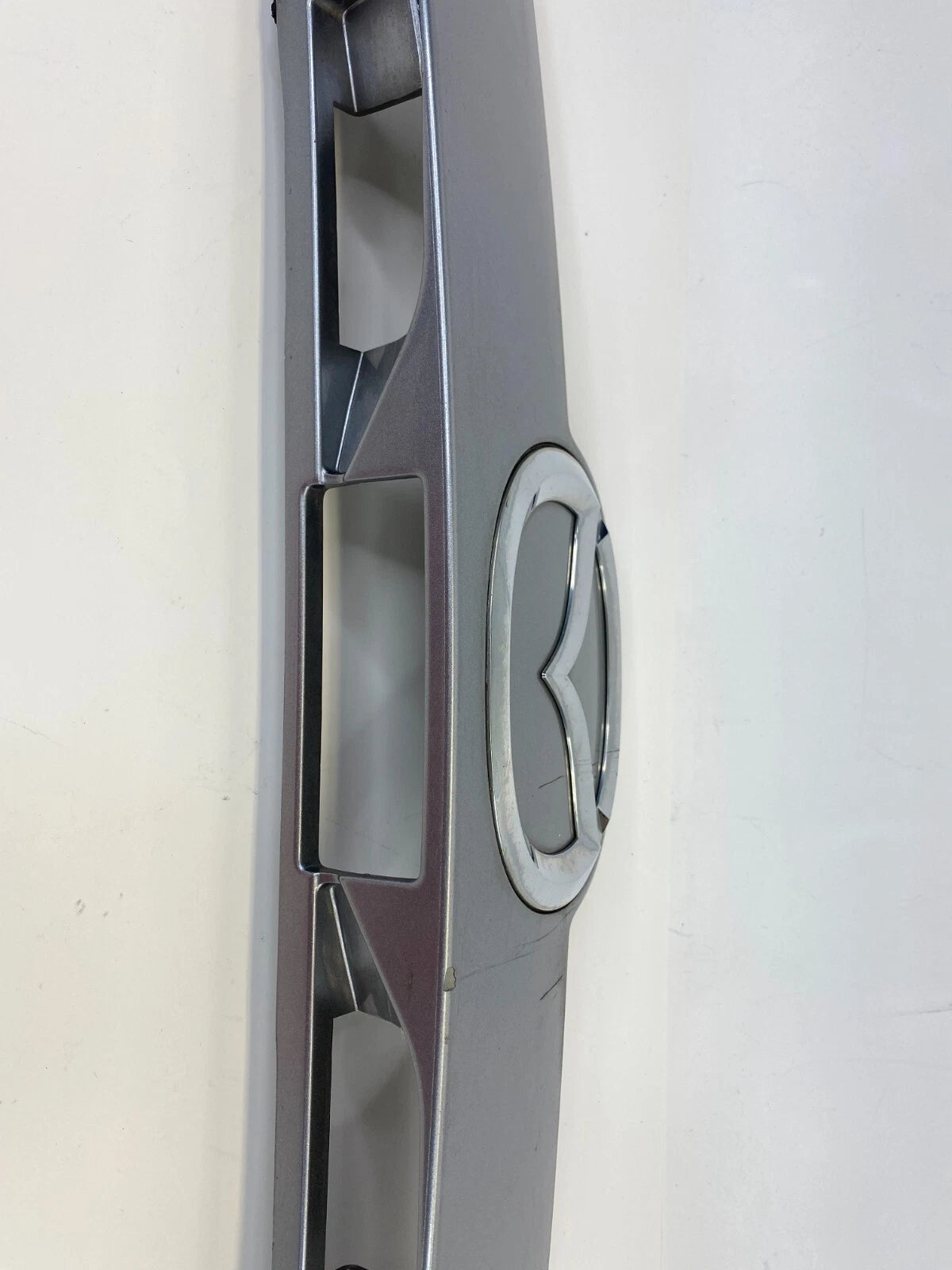 10-12 MAZDA CX-7 LIFTGATE TAILGATE TRUNK LID LICENSE LIGHT PLATE FINISH MOLDING