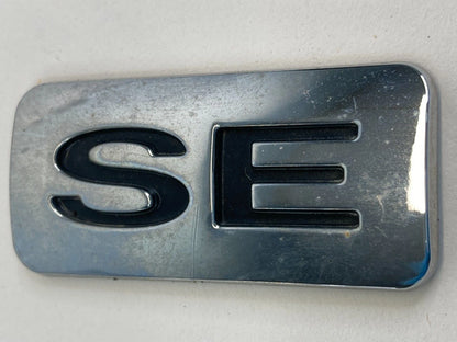2007-2011 FORD FOCUS SEDAN REAR TRUNK LID NAMEPLATE NAME PLATE ONLY SE TRIM OEM