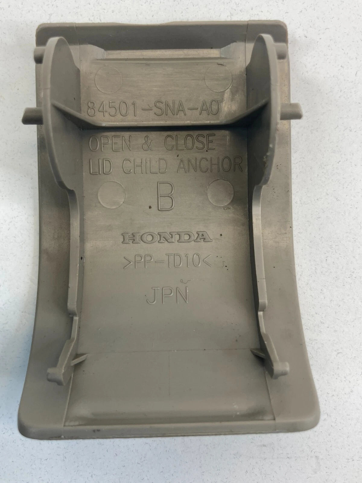 2006-2011 HONDA CIVIC SEDAN CHILD REAR SEAT RESTRAINT ANCHOR COVER 84501-SNA-A0