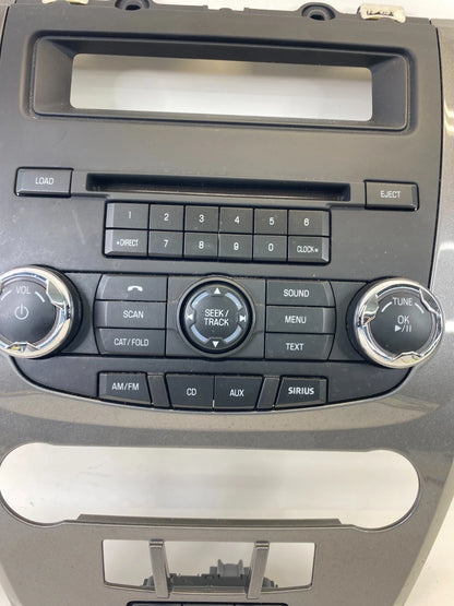 10-12 FORD FUSION CENTER DASH CD RADIO CONTROL PANEL W /BEZEL 9E5T18A802AE OEM