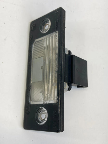 2009-2014 VOLKSWAGEN TIGUAN REAR LEFT OR RIGHT LICENSE PLATE LIGHT ASSEMBLY OEM
