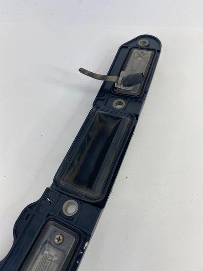 2005-2010 VOLKSWAGEN JETTA REAR LICENSE PLATE LIGHT LAMP OPENER HANDLE COVER OEM