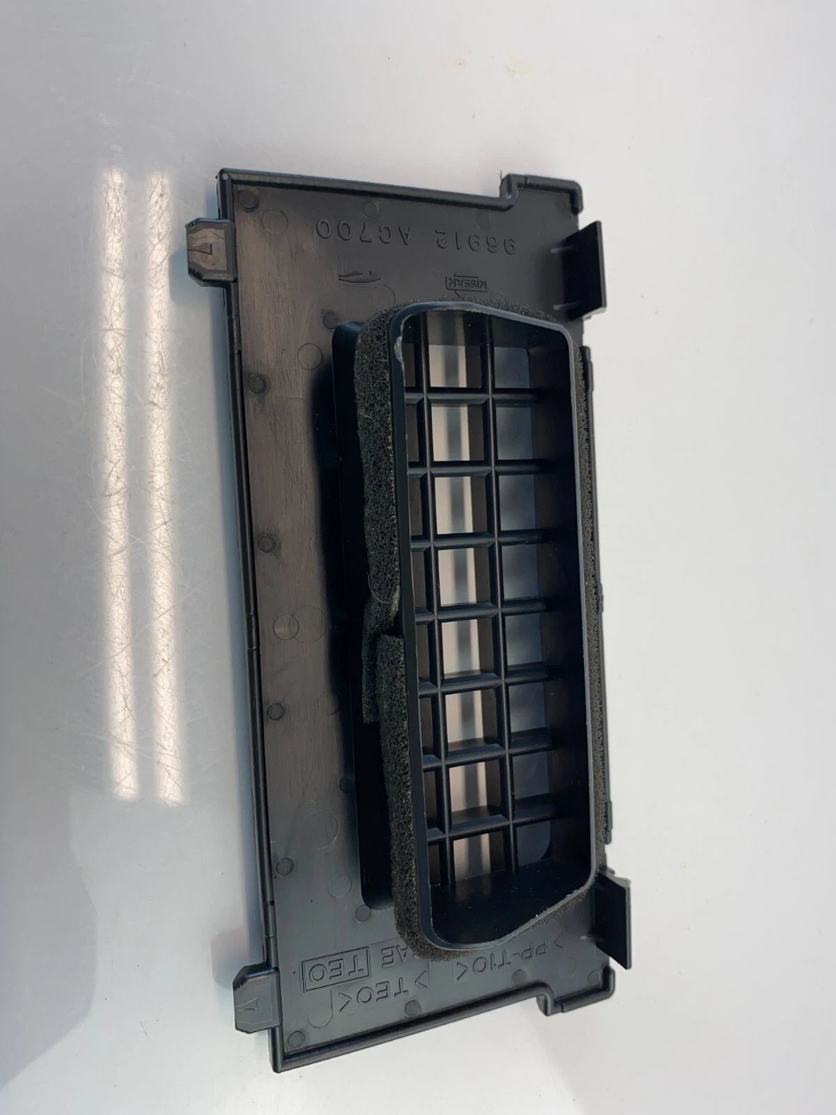 2005 2006 INFINITI G35 REAR CENTER CONSOLE INNER AC VENT GRILLE COVER 96912AC700