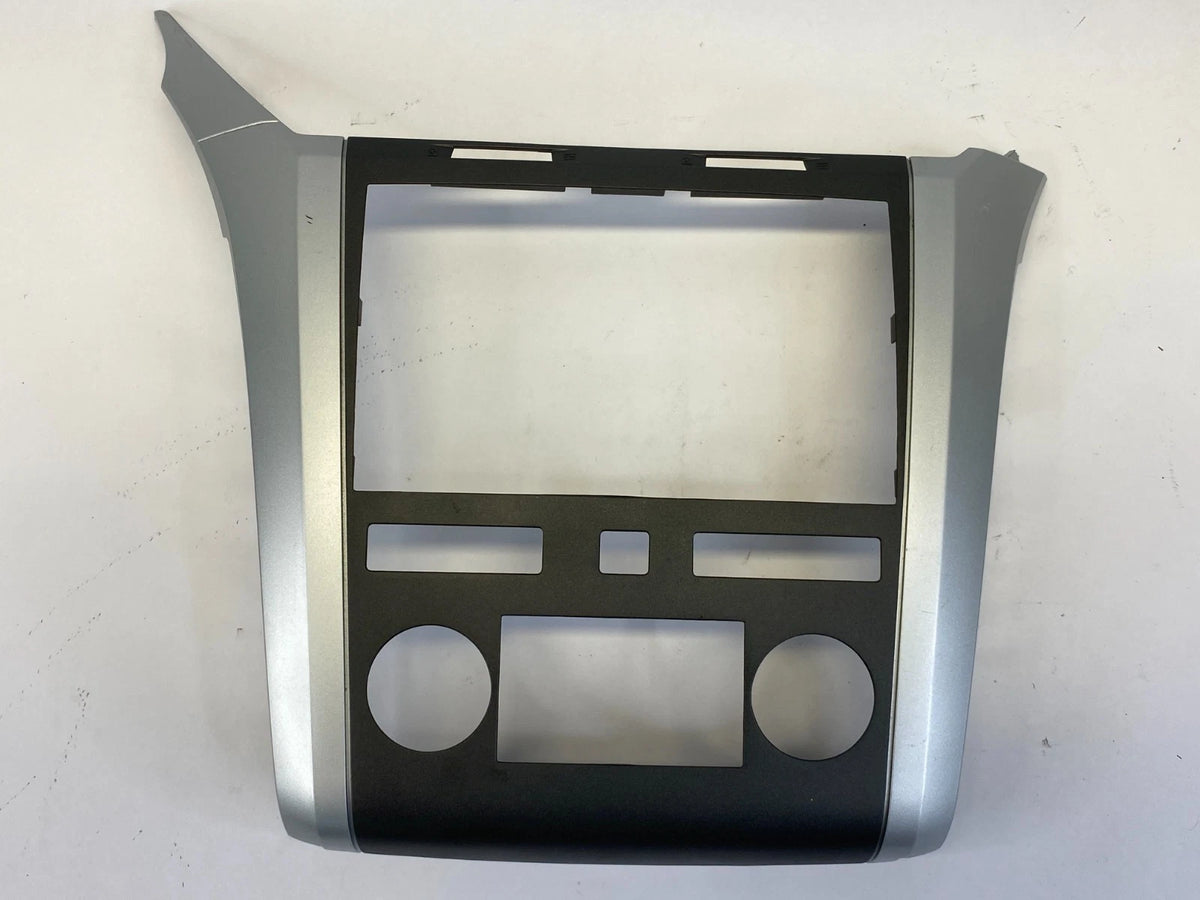 2009-2012 CHEVROLET TRAVERSE DASH RADIO CLIMATE BEZEL COVER TRIM 20989249 OEM
