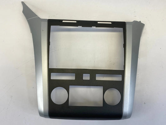 2009-2012 CHEVROLET TRAVERSE DASH RADIO CLIMATE BEZEL COVER TRIM 20989249 OEM