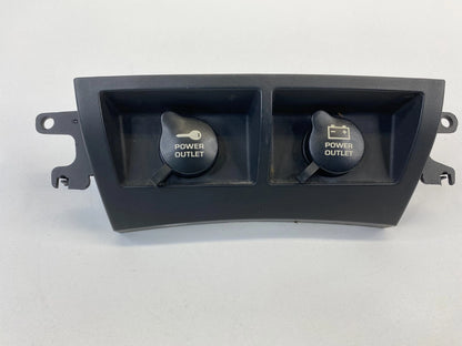 2004-2008 CHRYSLER PACIFICA FRONT CENTER DASH PANEL DUAL POWER OUTLET ASSEMBLY