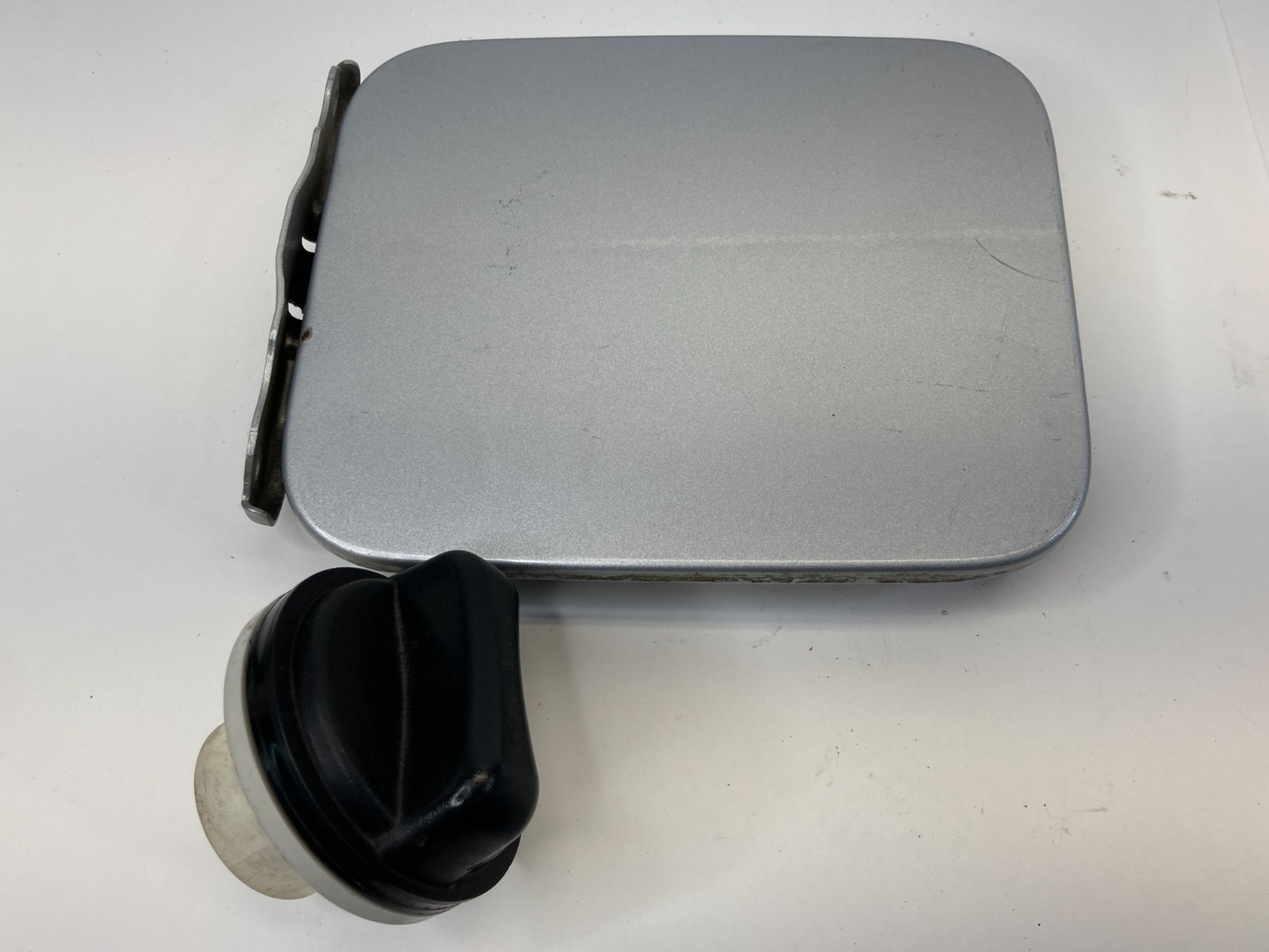 2004-2010 Infiniti QX56 Fuel Filler Gas Door Lid Cover W/ Tank Cap OEM