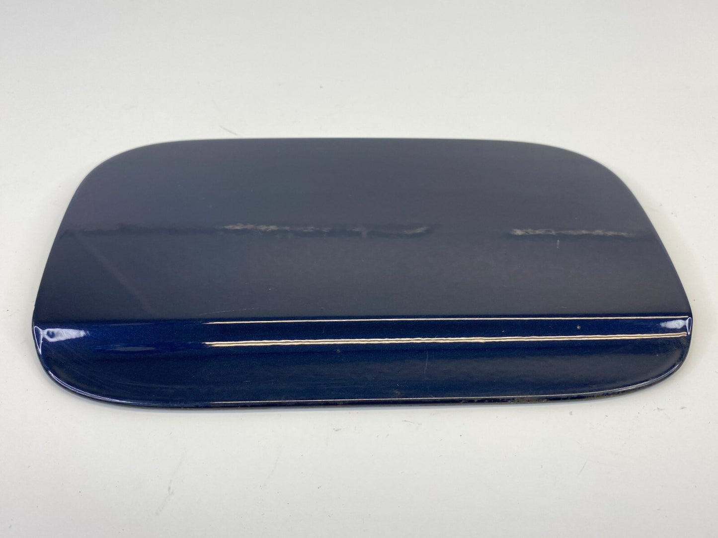 02-05 BMW 745i Sedan Fuel Filler Gas Tank Door Lid Cover Orient Blue Metallic