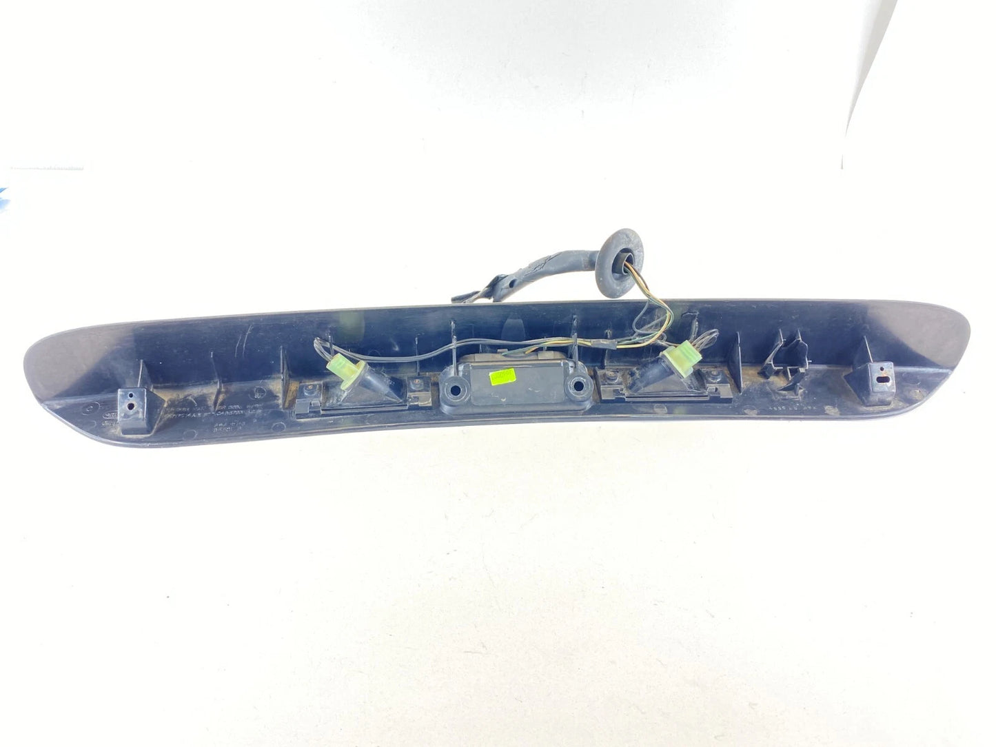 01-05 DODGE GRAND CARAVAN REAR LICENSE PLATE LIGHT FILLER MOULDING 04857231AE