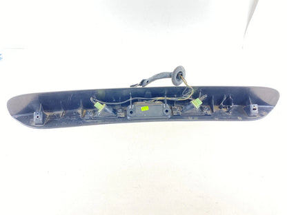 01-05 DODGE GRAND CARAVAN REAR LICENSE PLATE LIGHT FILLER MOULDING 04857231AE