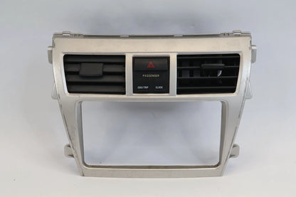 2007-2012 TOYOTA YARIS CENTER DASH RADIO BEZEL W/ AIR VENTS & HAZARD SWITCH OEM