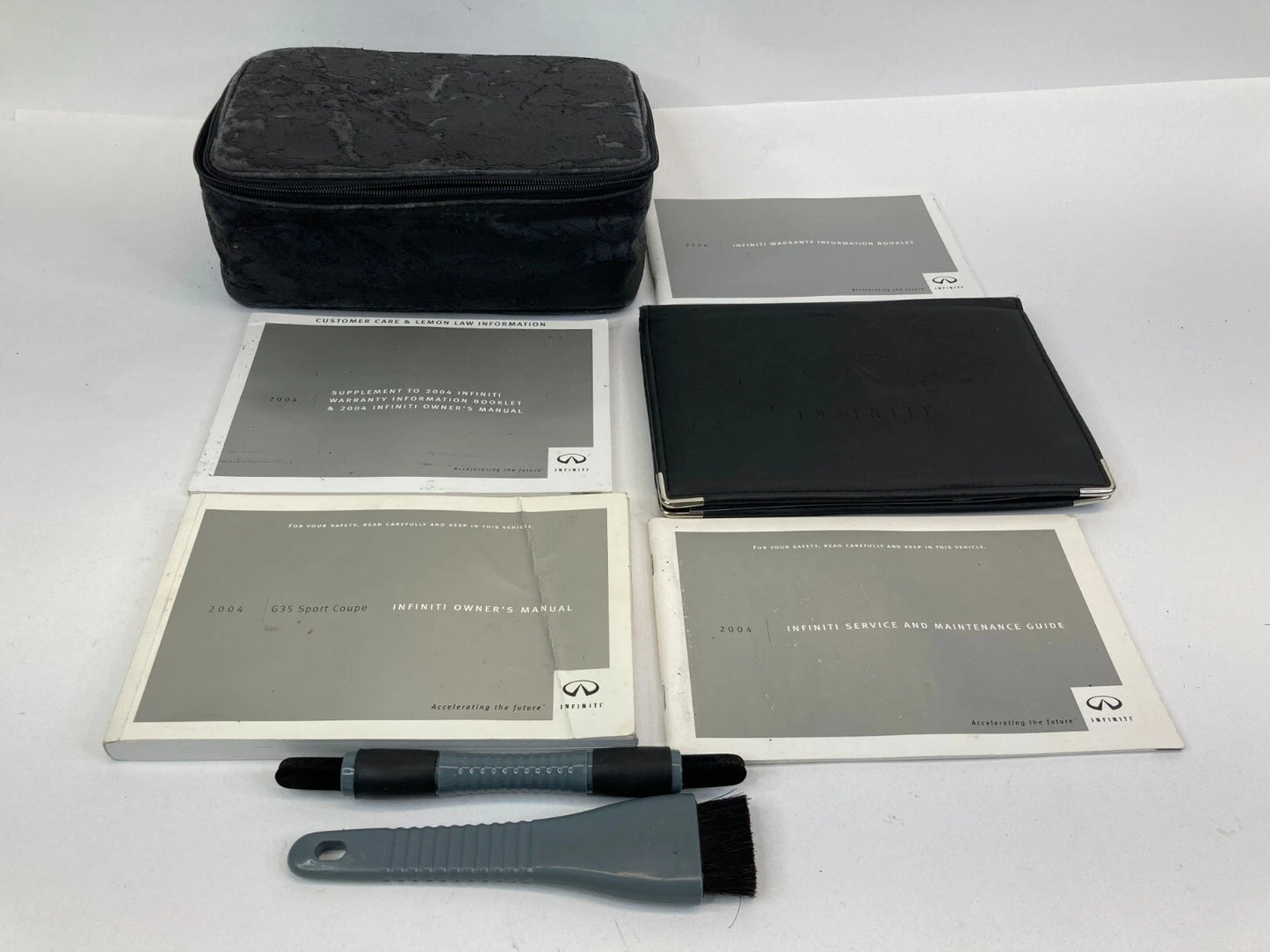 2004 INFINITI G35 COUPE OWNER'S MANUAL WARRANTY INFORMATION BOOKLET W/ CASE