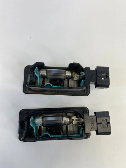 2006 BMW 330XI SEDAN REAR TRUNK LID LICENSE PLATE LIGHT LAMP SET PAIR OEM