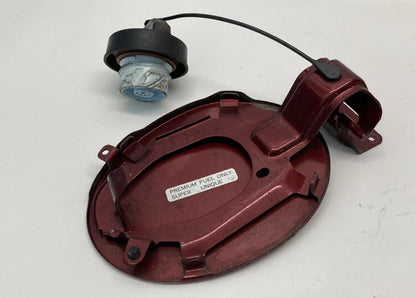 2007-2009 MAZDA CX-7 FUEL FILLER DOOR GAS LID COVER COPPER RED MICA W/ CAP OEM