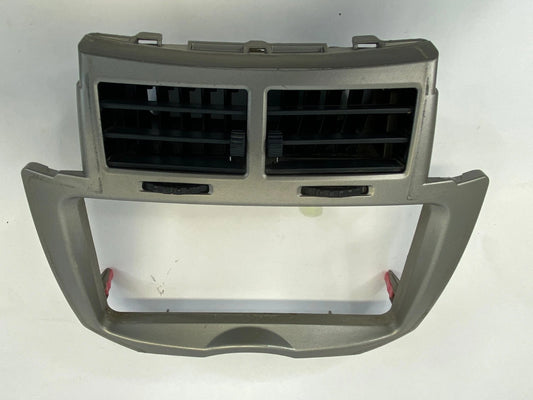 2009-2011 TOYOTA YARIS CENTER DASH RADIO BEZEL TRIM W/ AIR VENTS OEM 55405-52580