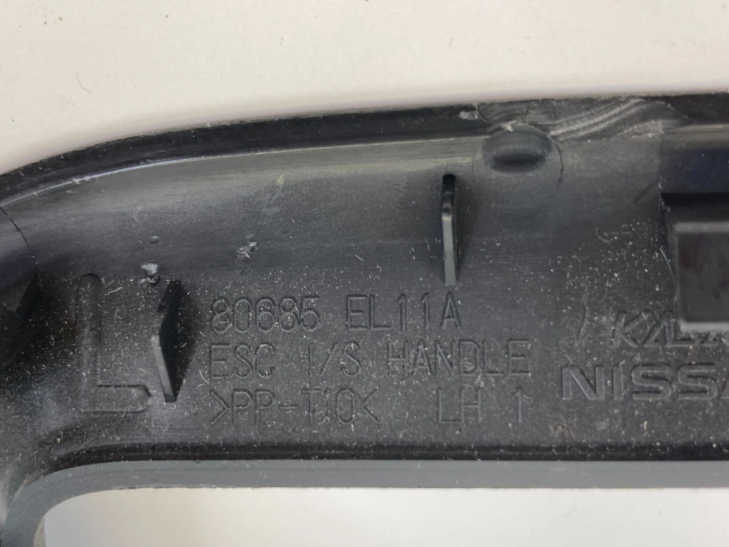 2007-2011 NISSAN VERSA REAR LEFT DOOR INTERIOR HANDLE TRIM BEZEL 80685-EL11A OEM