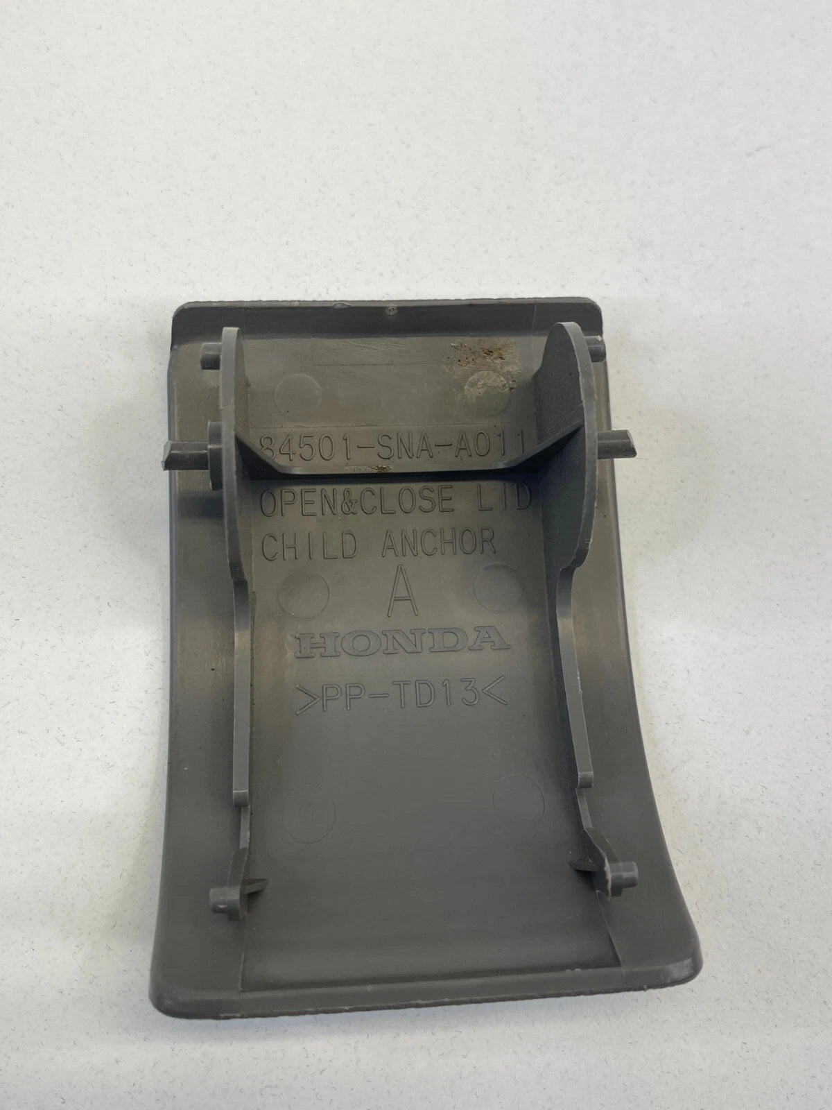2006-2011 HONDA CIVIC DECK LID CHILD SEAT RESTRAINT ANCHOR COVER 884501-SNA-A01