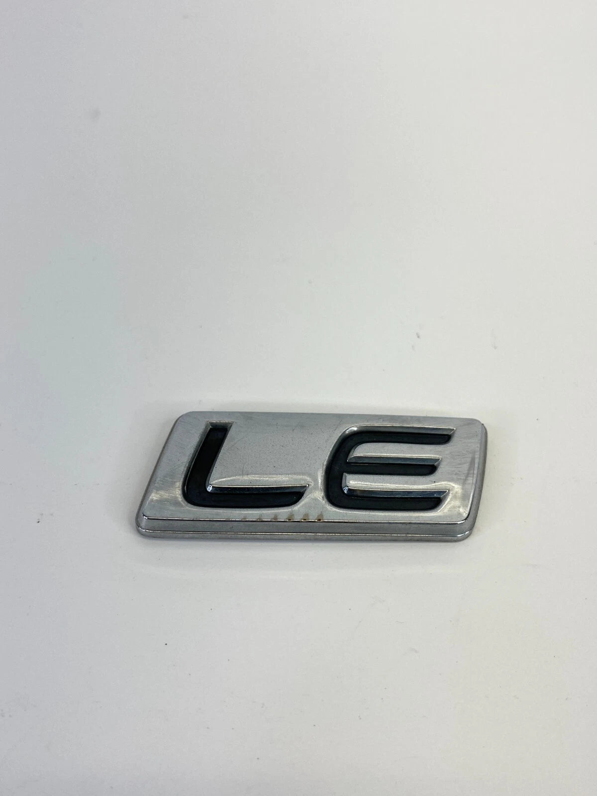 03 04 05 06 07 08 TOYOTA COROLLA LE TRUNK LID LOGO EMBLEM BADGE CHROME OEM