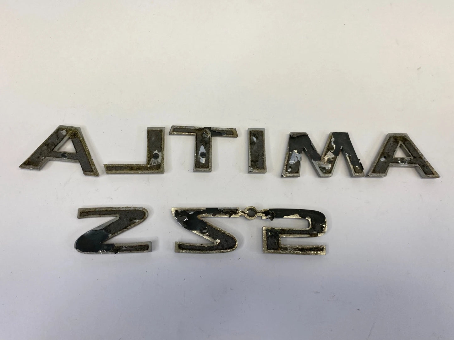 2002-2006 NISSAN ALTIMA REAR DECK LID TRUNK EMBLEM BADGE LETTERS CHROME OEM