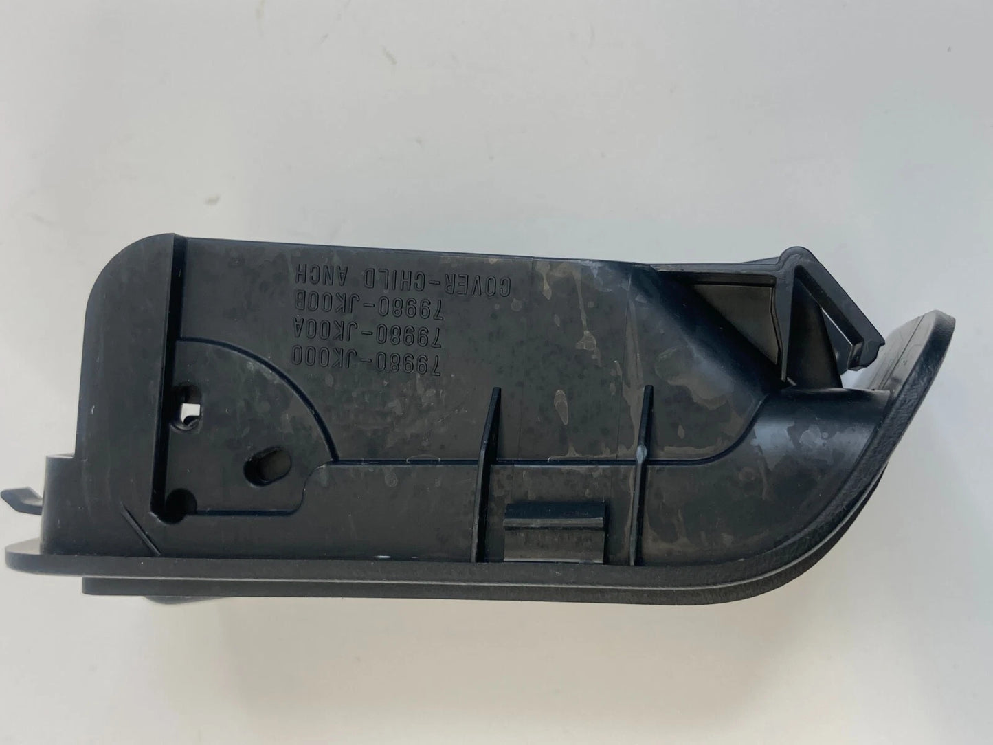 2007 2008 INFINITI G35 SEDAN REAR CHILD SEAT HOOK ANCHOR COVER 79980-JK000 OEM