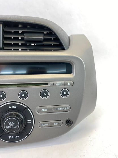 09-13 HONDA FIT AM FM RADIO STEREO DASH BEZEL PANEL ASSEMBLY 39100-TK6-A013 OEM