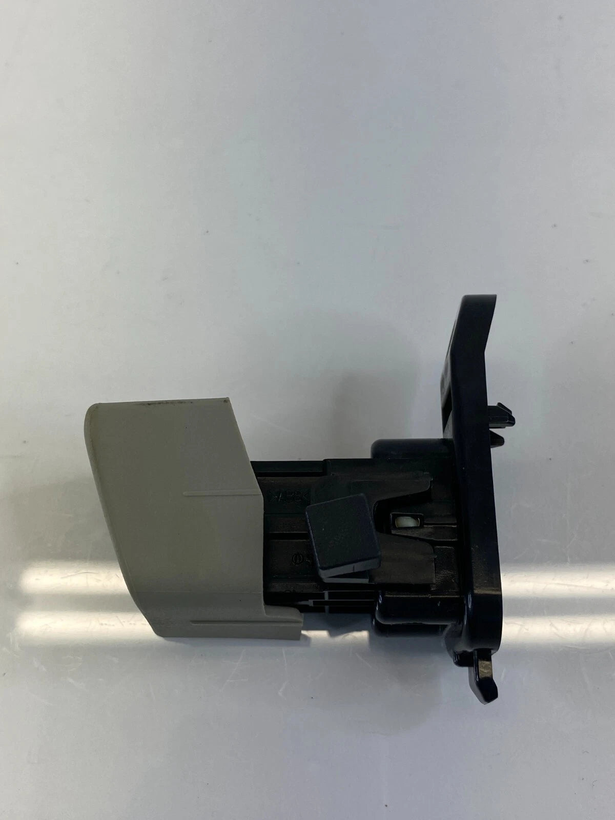 2010-2015 TOYOTA PRIUS DASH LOWER GLOVE BOX LATCH RELEASE BUTTON OEM FACTORY