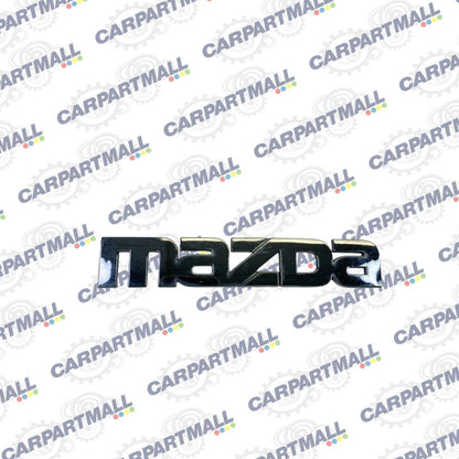 2000-2006 MAZDA MPV REAR TRUNK LID SYMBOL NAMEPLATE BADGE LOGO LC62-51710 OEM