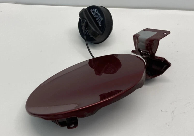 2007-2009 MAZDA CX-7 FUEL FILLER DOOR GAS LID COVER COPPER RED MICA W/ CAP OEM