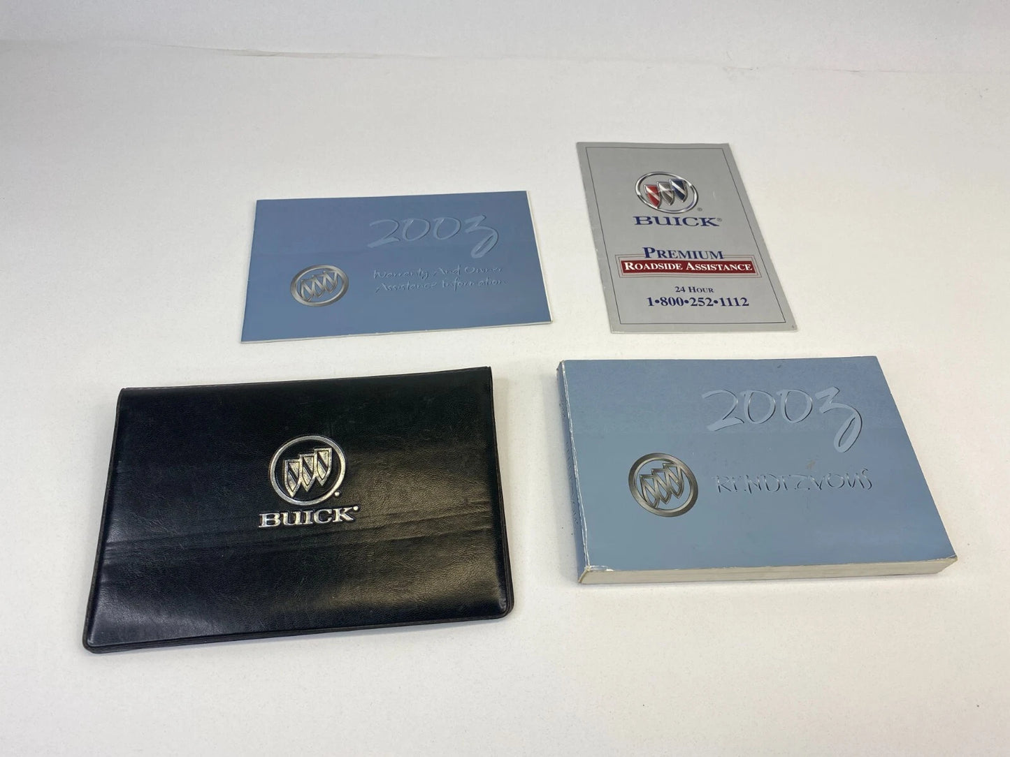2003 BUICK RENDEZVOUS OWNERS MANUAL WARRANTY ASSISTANCE GUIDE BOOK W/ CASE
