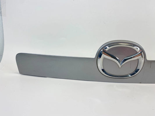 2010-2012 MAZDA CX-7 TAILGATE LICENSE PLATE LIGHT GARNISH TRIM REAR E227-50-810F