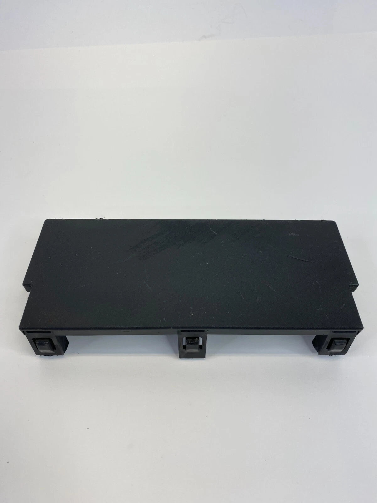 07 08 INFINITI G35 CENTER CONSOLE MASK CUBBY STORAGE ARMREST COVER 96912-JK00A