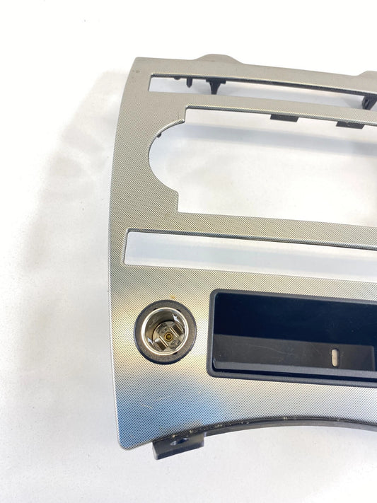 2005-2007 JEEP GRAND CHEROKEE DASH CLIMATE CONTROL TRIM BEZEL W/ POWER OUTLET
