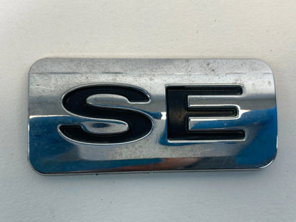 2007-2011 FORD FOCUS SEDAN REAR TRUNK LID NAMEPLATE NAME PLATE ONLY SE TRIM OEM