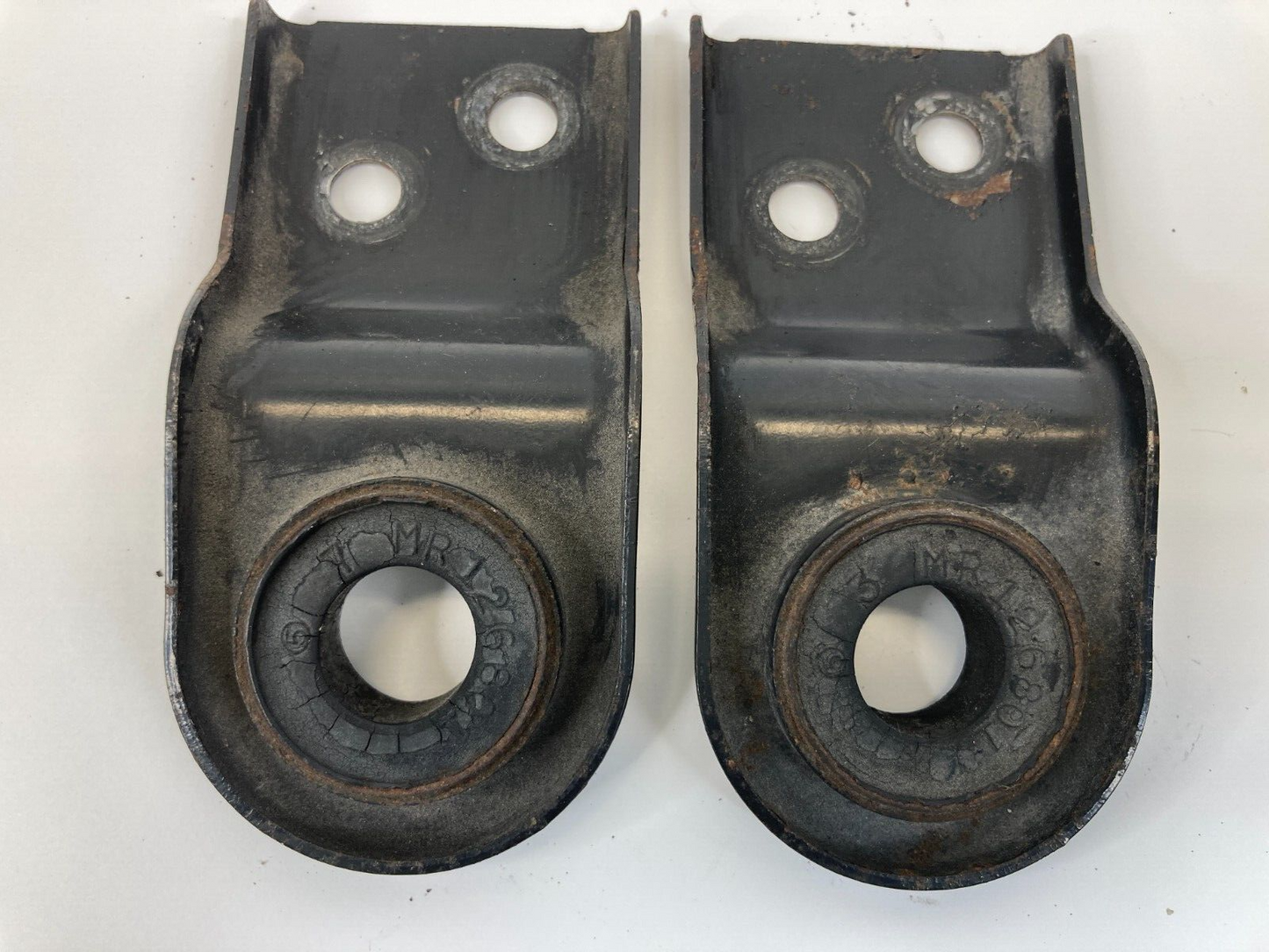 1997-2003 Mitsubishi Montero Sport Radiator Bracket Support Pair Set OEM