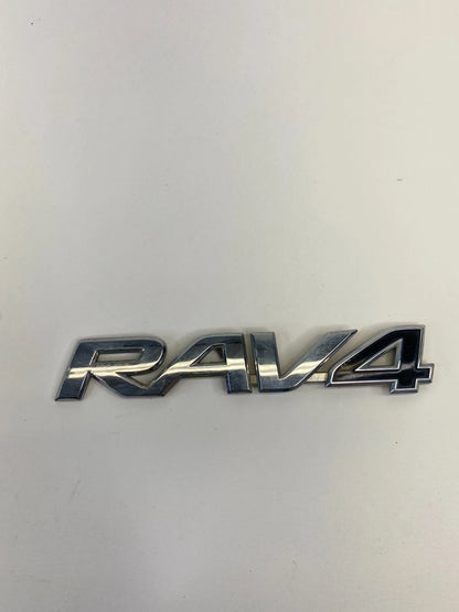 2004-2012 TOYOTA RAV4 REAR BACK DOOR TAILIGATE TAIL GATE EMBLEM NAMEPLATE OEM