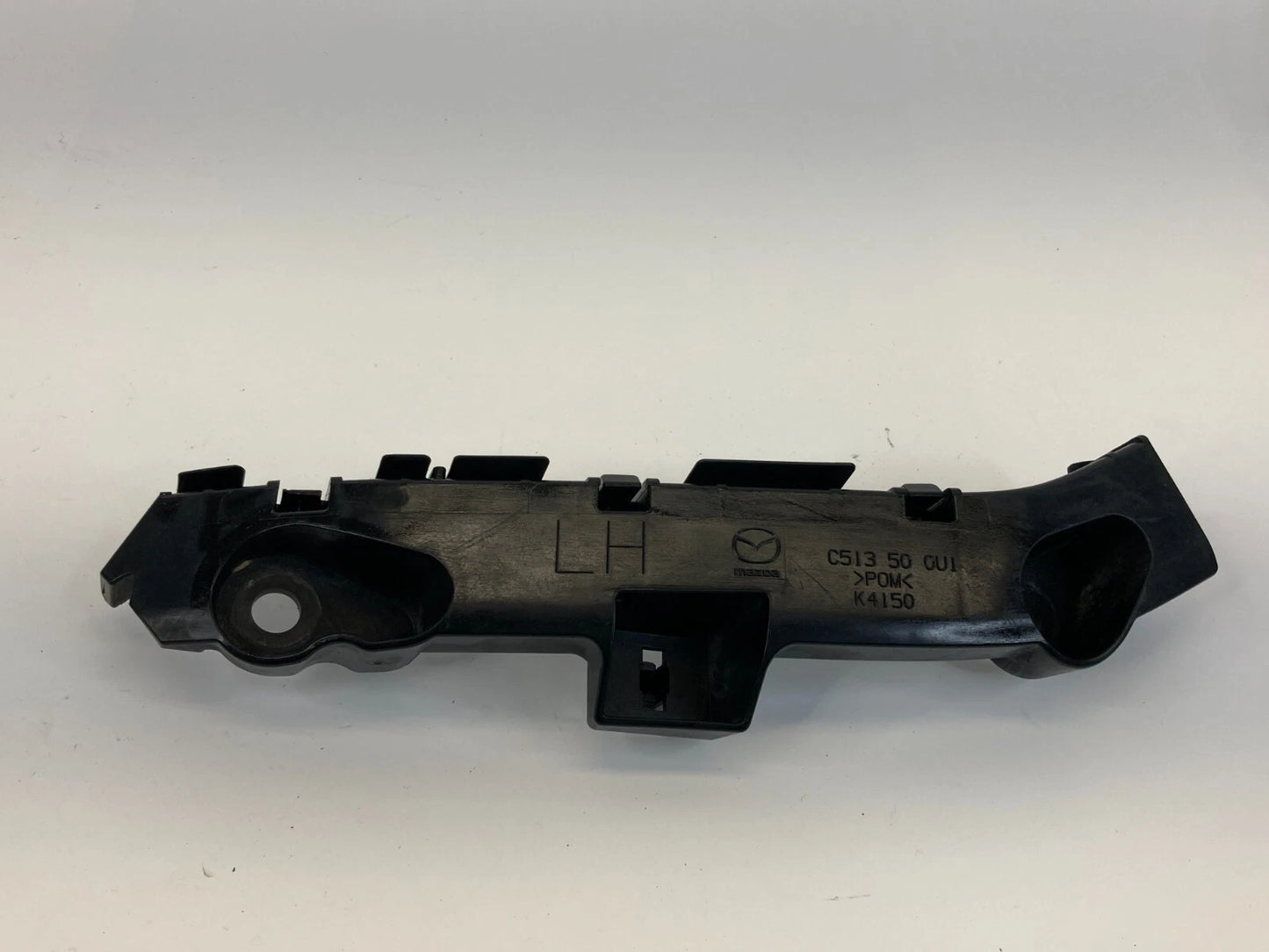 2012-2015 MAZDA 5 MAZDA5 FRONT LEFT BUMPER RETAINER BRACKET COVER C513500U1 OEM