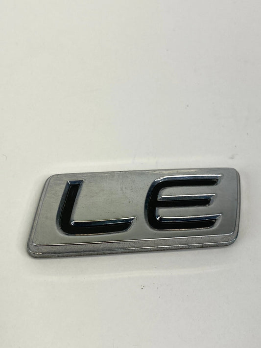 2009-2013 TOYOTA COROLLA LE REAR EMBLEM TRUNK LOGO BADGE NAMEPLATE LUGGAGE OEM