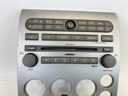 05 06 NISSAN ARMADA CD RADIO PLAYER RECEIVER CLIMATE HEATER CONTROL BEZEL PANEL