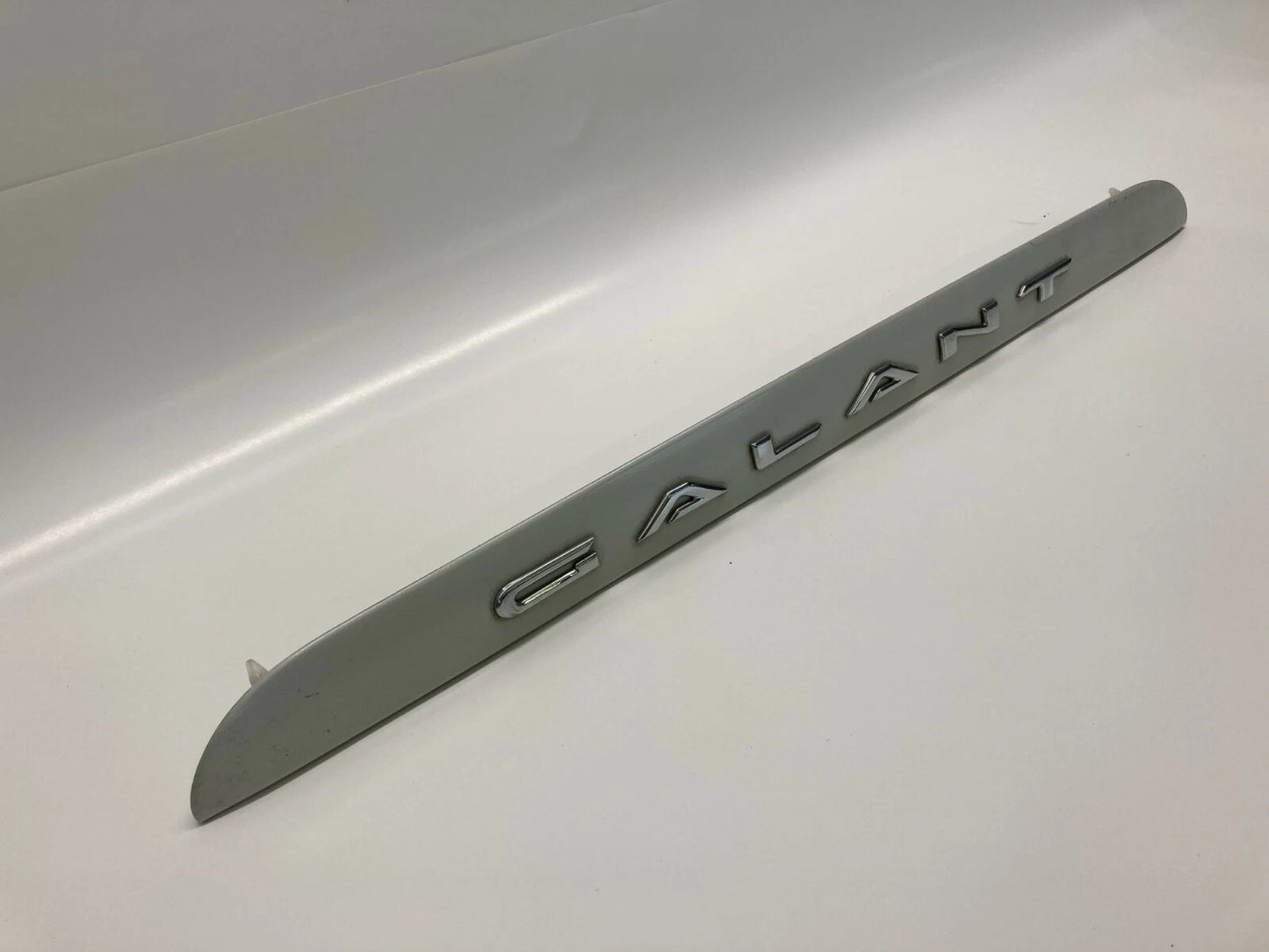 1999-2003 MITSUBISHI GALANT TRUNK HANDLE TRIM MOLDING PLATE BEZEL OEM FACTORY